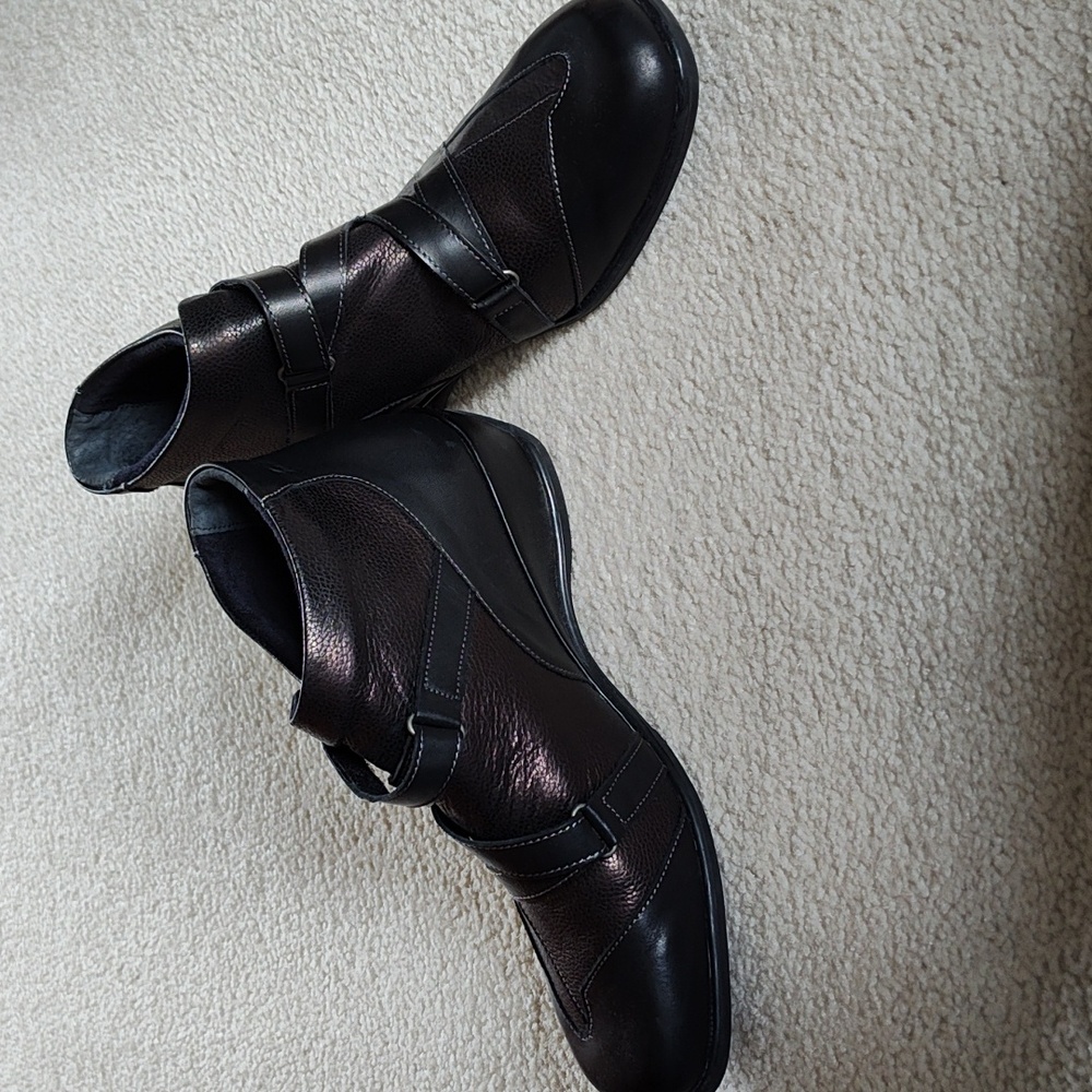Copper and black leather booties.